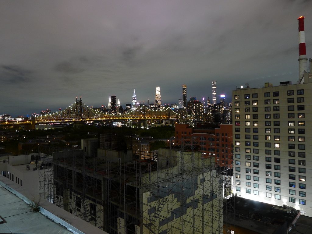 The Manhattan skyline and the Queensboro Bridge at night from Long Island City