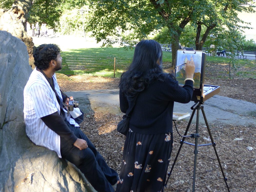 A painter at an easel in Central Park