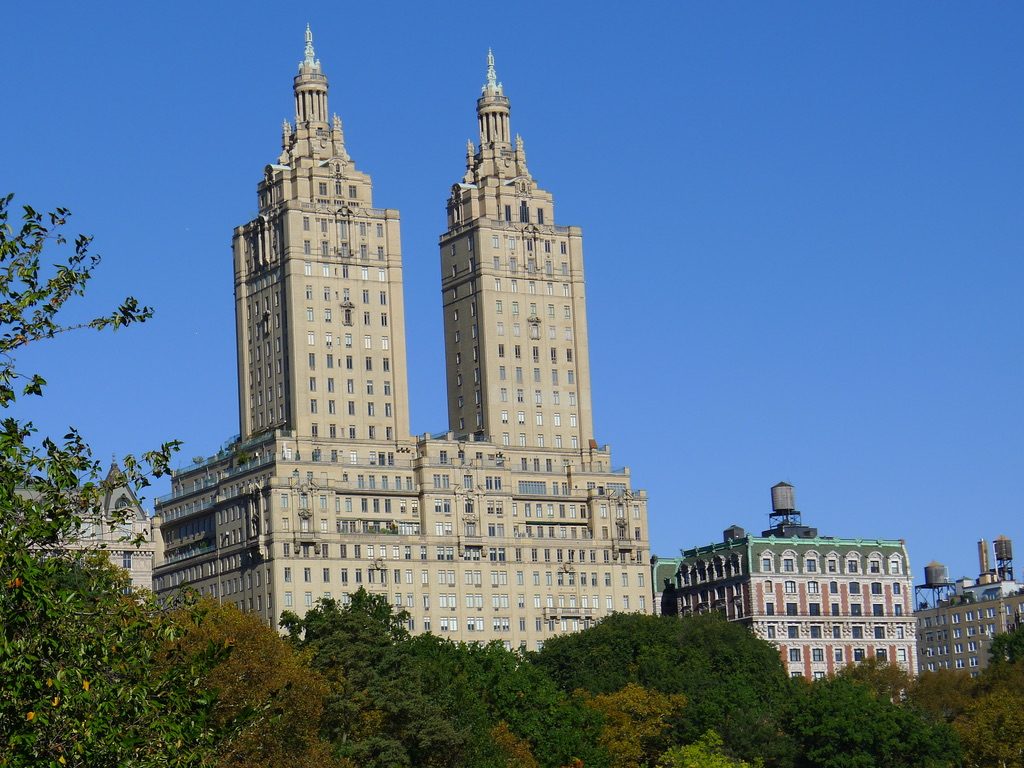 The San Remo towers above the trees